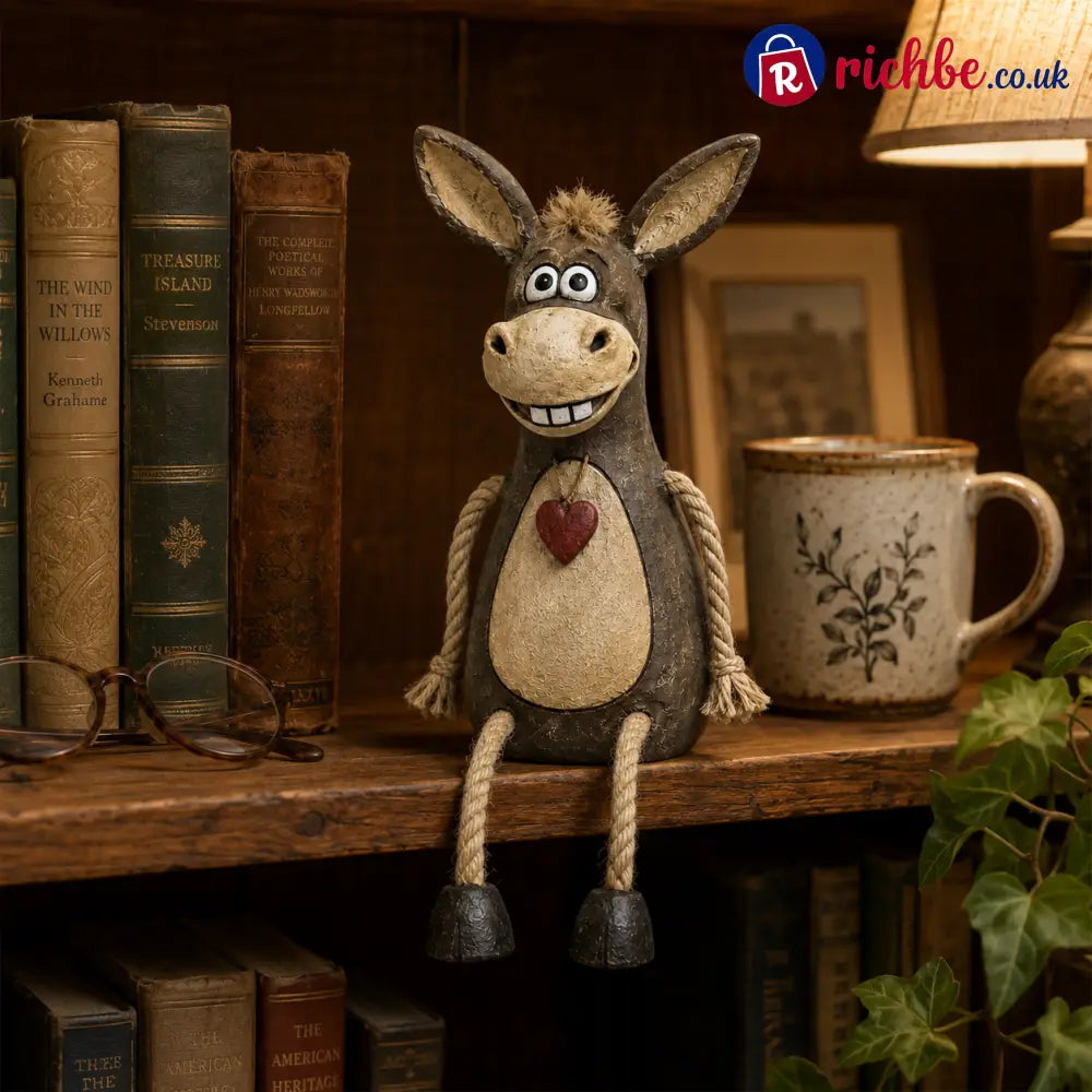 Rustic figurine of a donkey on a plank with rope legs hanging down