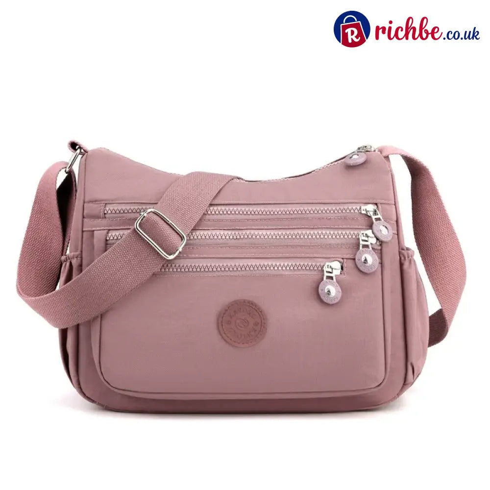🎒 ✨ Lightweight Nylon Crossbody Bag – Multi-Pocket Water-Resistant Adjustable 🔧 - Pink