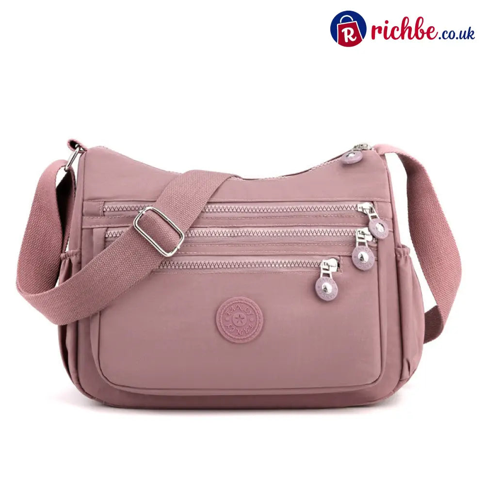 🎒 Multi-Pocket Campus Nylon Crossbody Bag - Soft Pink