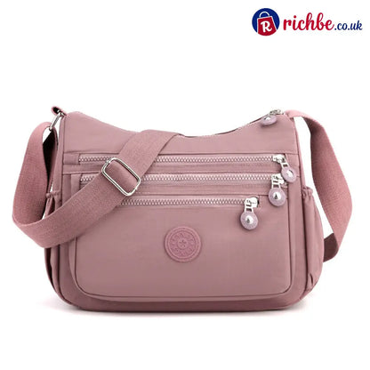🎒 Multi-Pocket Campus Nylon Crossbody Bag - Soft Pink