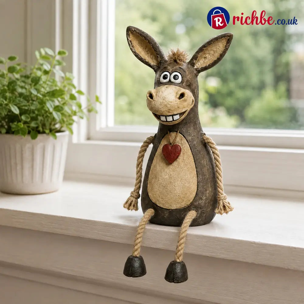 Rustic figurine of a donkey on a plank with rope legs hanging down