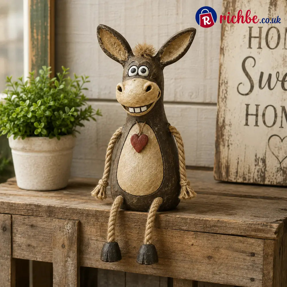 Rustic figurine of a donkey on a plank with rope legs hanging down
