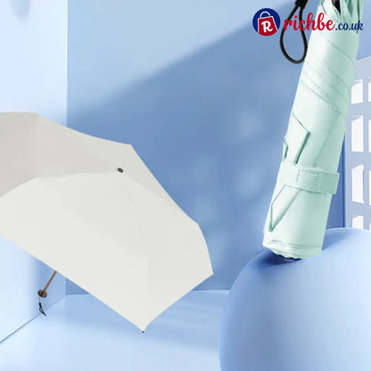 ✨ Say Goodbye to Bulky Umbrellas – Ultra-Light Sun & Rain Protection for On-the-Go! ✨ - Hot Sale