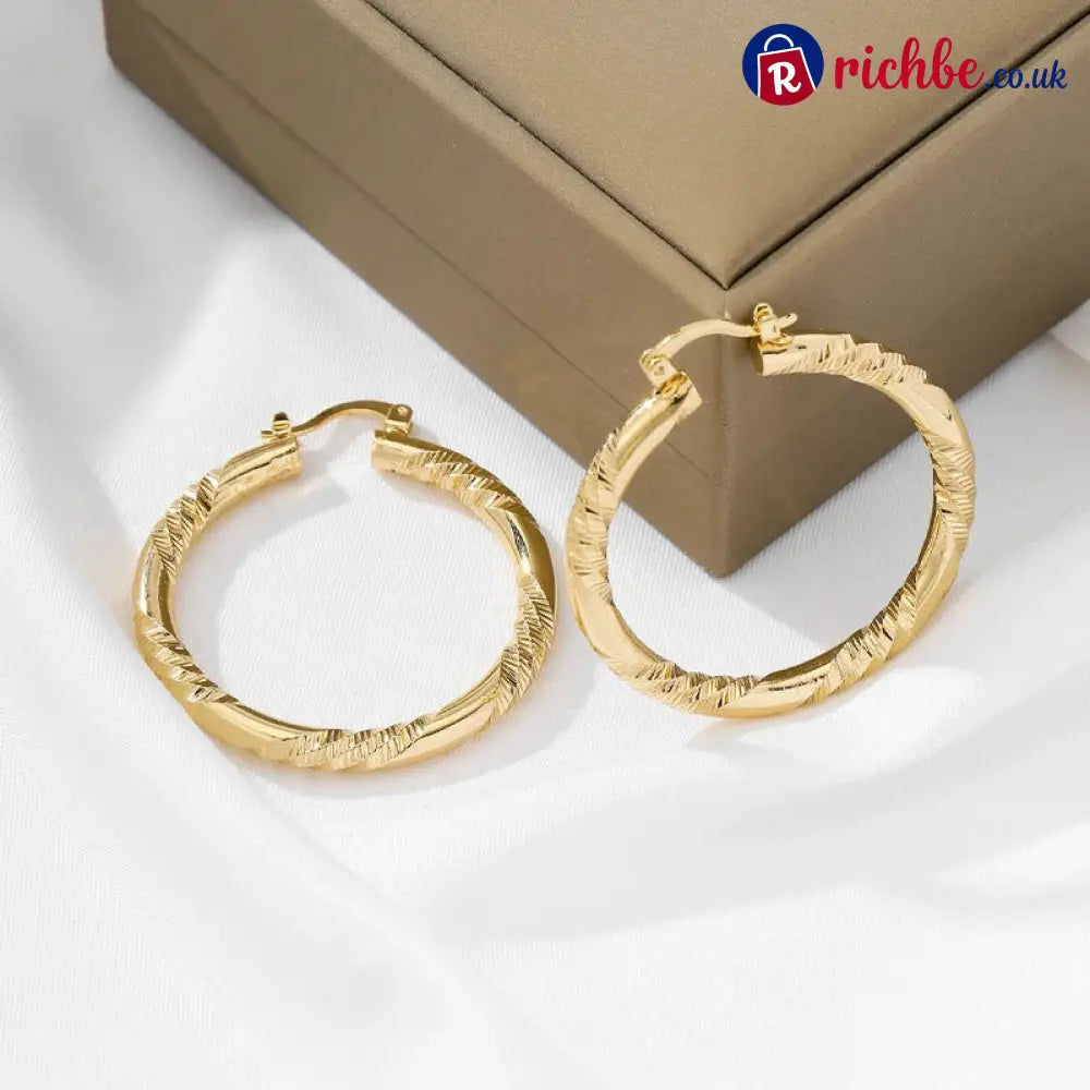 💥Women’s Elegant Twisted Hoop Earrings